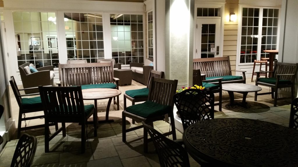 Another view of the outdoor seating at night.