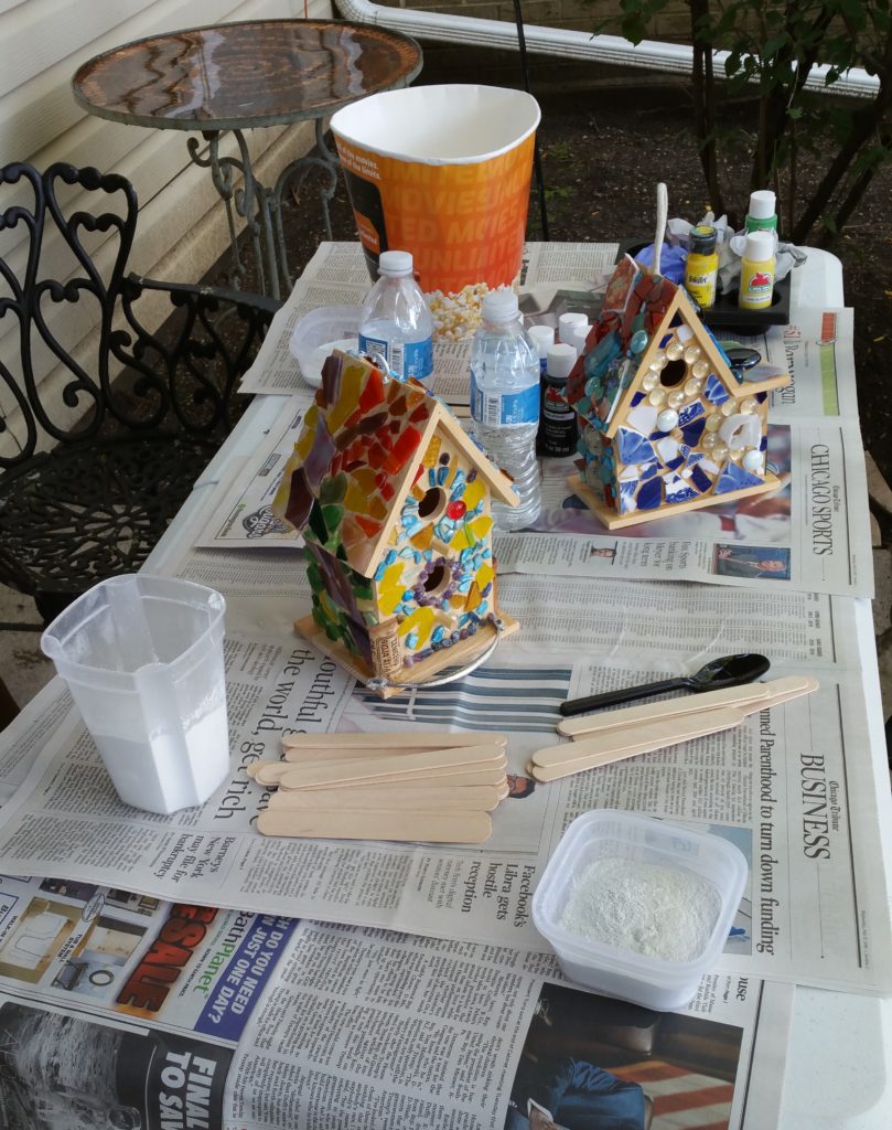 Getting ready to grout our mosaic birdhouses.