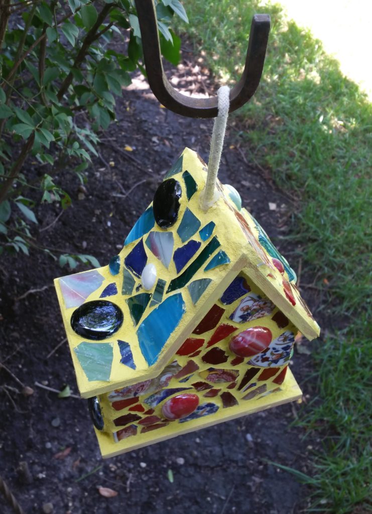 Showing more views of the finished birdhouse.